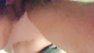 Bent over in the laundry room