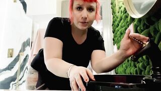 Proxy Paige playing with a banana